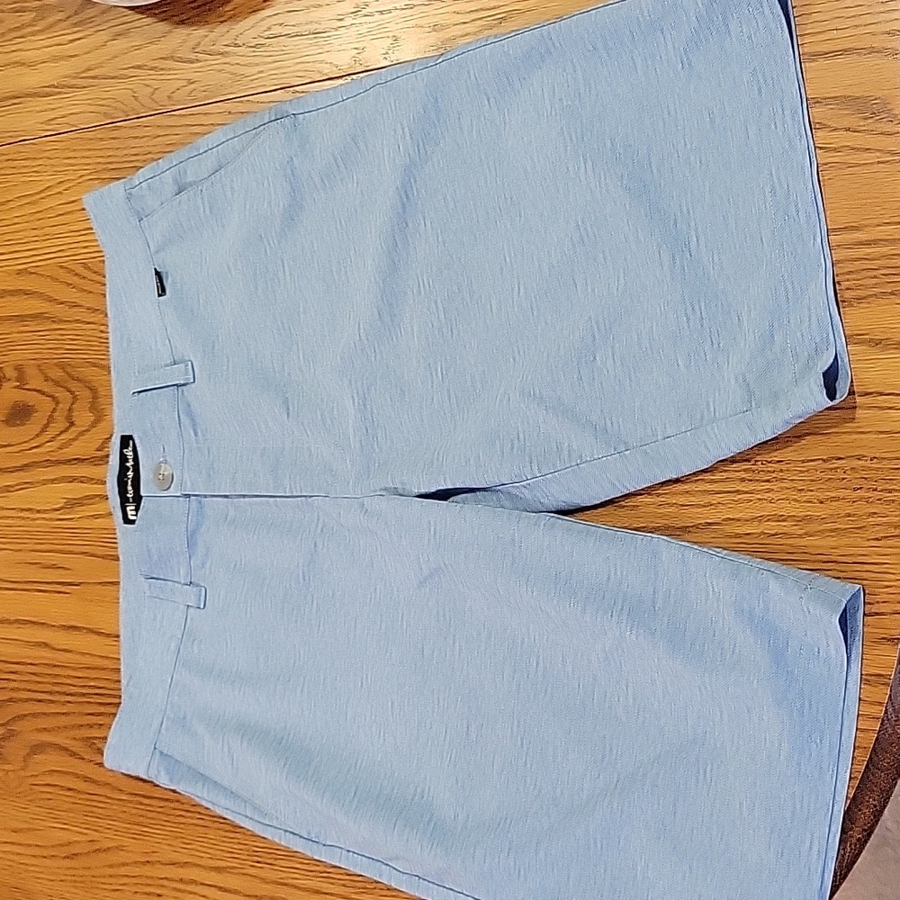 Travis Mathew blue shorts